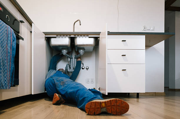 Professional Drain Cleaning technician working in Maroa, IL